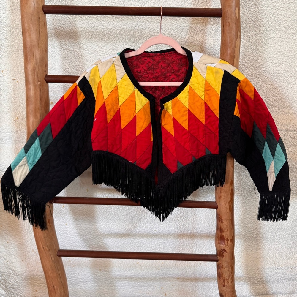 Handmade quilt coat, cropped with fringe.